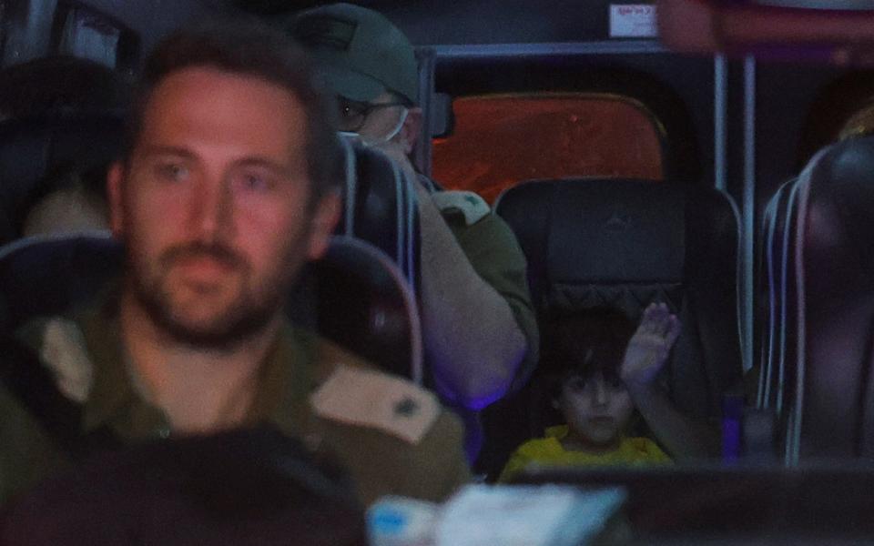 Oria Brodutch, 4, is seen inside a van transporting the freed hostages