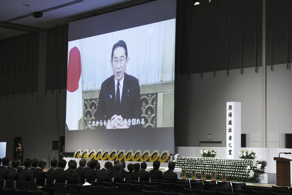 A video message from Japan's Prime Minister Fumio Kishida is delivered during a ceremony to mark the 78th anniversary of the atomic bombing in Nagasaki, southern Japan Wednesday, Aug. 9, 2023. The ceremony was held indoors and scaled down due to approaching Tropical Storm Khanun. (Kyodo News via AP)