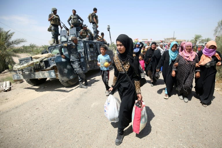 Iraqi families near al-Sejar village in Iraq's Anbar province, pictured after fleeing Fallujah on May 27, 2016