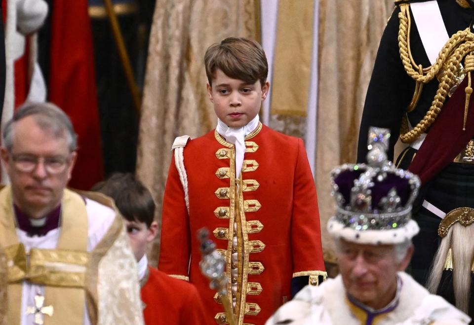 london, england may 06 page of honour prince george of wales departs the ceremony during the coronation of king charles iii and queen camilla on may 06, 2023 in london, england the coronation of charles iii and his wife, camilla, as king and queen of the united kingdom of great britain and northern ireland, and the other commonwealth realms takes place at westminster abbey today charles acceded to the throne on 8 september 2022, upon the death of his mother, elizabeth ii photo by gareth cattermolegetty images