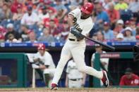 May 26, 2018; Philadelphia, PA, USA; Philadelphia Phillies right fielder Nick Williams (5) hits a home run during the eighth inning against the Toronto Blue Jays at Citizens Bank Park. Mandatory Credit: Bill Streicher-USA TODAY Sports