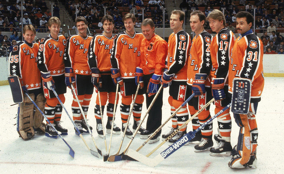 <p>WORST: 1986 NHL All-Star Game, in Hartford. That's a lot of orange and a lot of stars. Also, a lot of Oilers. From left to right: goalie Andy Moog, Wayne Gretzky, Glenn Anderson, Paul Coffey, Kevin Lowe, head coach Glen Sather, Mark Messier, Lee Fogolin, Jari Kurri and goalie Grant Fuhr. (Getty Images) </p>