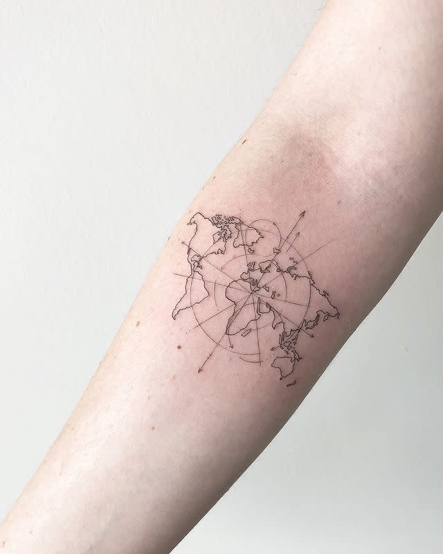 8) This World Map Capricorn Tattoo