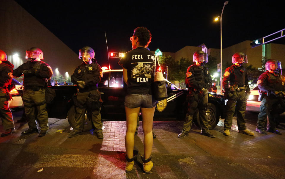 <p>Riot police block off the Albuquerque Convention Center to anti-Trump protests following a rally and speech there by Republican presidential candidate Donald Trump in Albuquerque, N.M., Tuesday, May 24, 2016. (AP Photo/Brennan Linsley) </p>