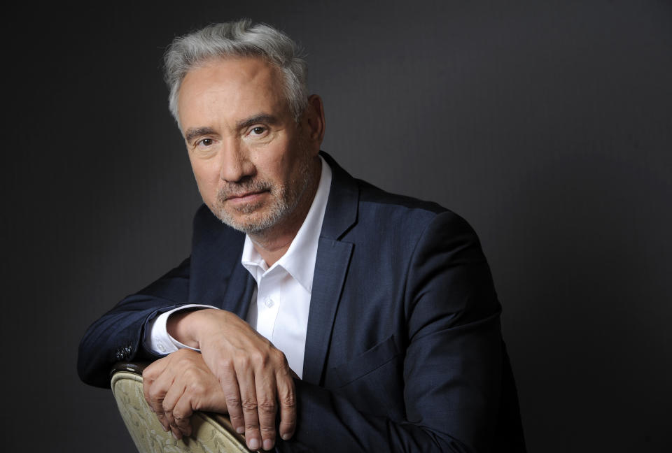 In this Tuesday, June 18, 2013 photo, Roland Emmerich. director of the film "White House Down," poses for a portrait in Beverly Hills, Calif. The action-packed film starring Jamie Foxx as the President of the United States of America and Channing Tatum as his impromptu bodyguard releases Friday, June 28, 2013. (Photo by Chris Pizzello/Invision/AP)