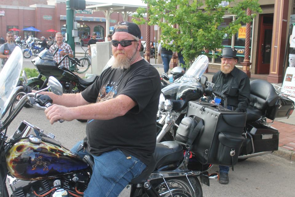 Red Garrett and Kenneth Burris sit on their bikes at the Steel Horse Rally Friday, May 6 in Fort Smith.