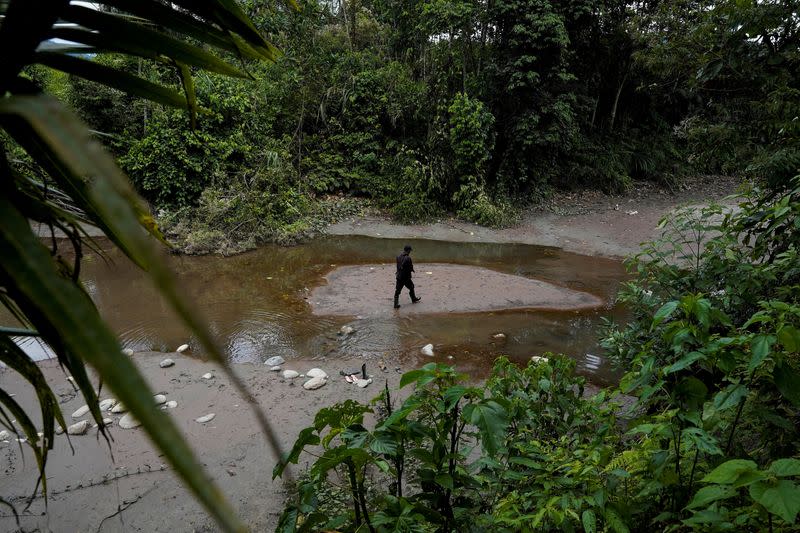 FILE PHOTO: With court's backing, Ecuador's indigenous patrol Aguarico river to block Amazon mining