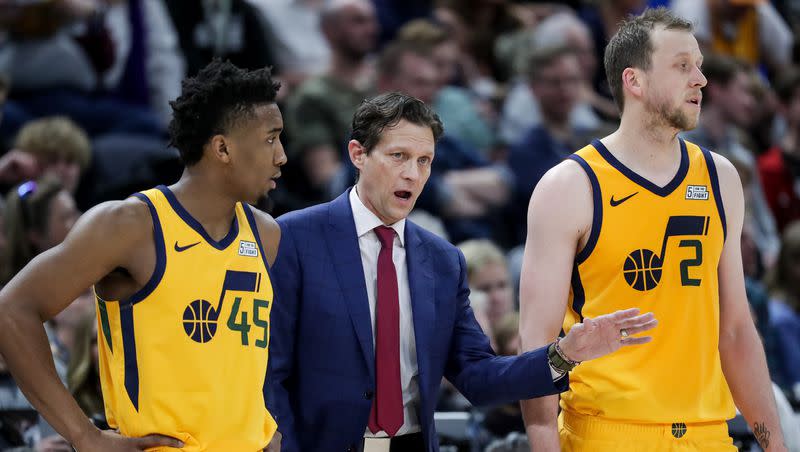 Utah Jazz head coach Quin Snyder talks to guard Donovan Mitchell (45) and center Rudy Gobert (27) during the game against the Chicago Bulls at Vivint Smart Home Arena in Salt Lake City on Saturday, Jan.  12, 2019.