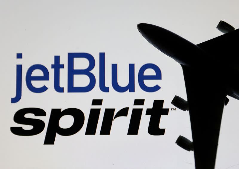 FILE PHOTO: Illustration shows Spirit Airlines and jetBlue Airways logos
