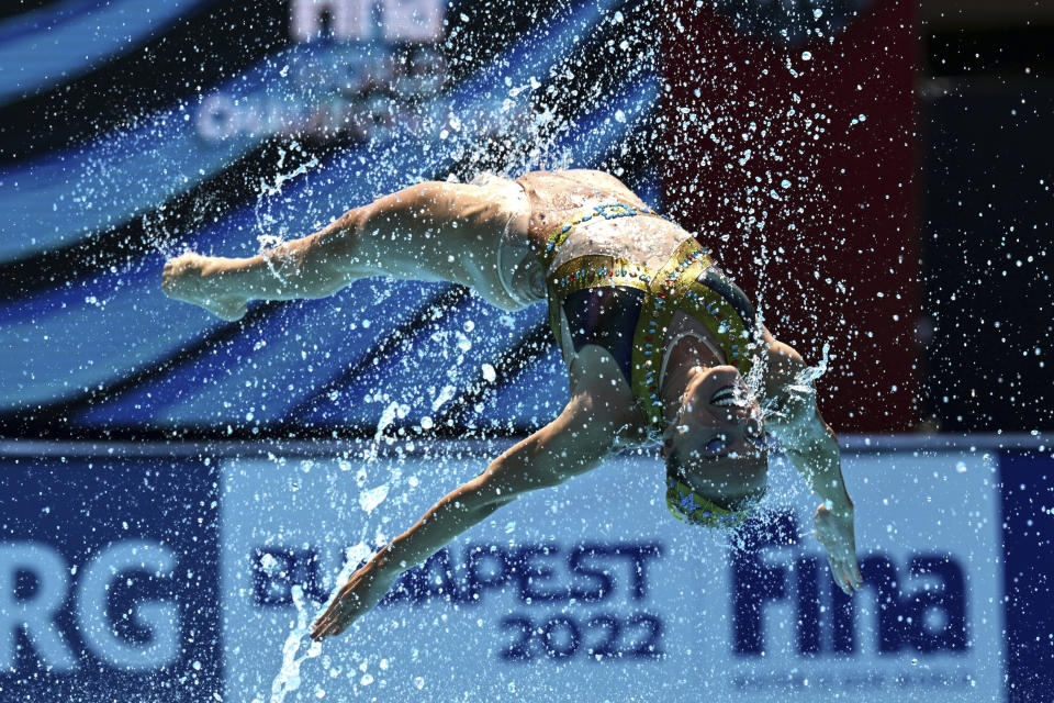 Team Brazil competes during mixed duet technical of artistic swimming at the 19th FINA World Championships in Budapest, Hungary, Saturday, June 18, 2022. (AP Photo/Anna Szilagyi)