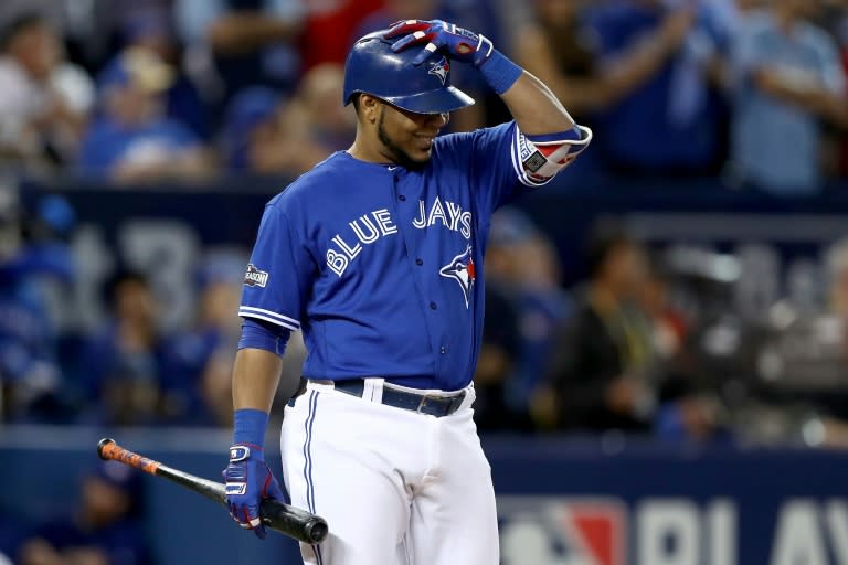 Edwin Encarnacion of the Toronto Blue Jays reacts in the ninth inning against the Cleveland Indians during game five of the American League Championship Series