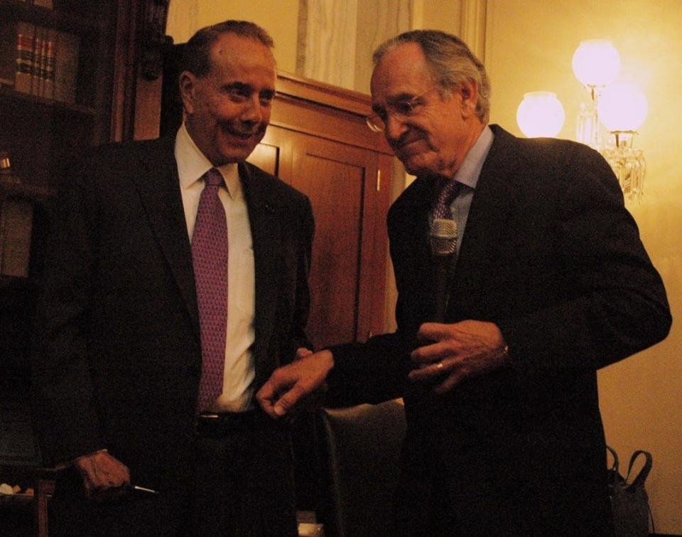 Former U.S. Sen. and presidential candidate Bob Dole, left, and former U.S. Sen. Tom Harkin, a Democrat from Iowa, right, in this undated photo.