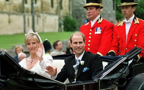 Prince Edward and Sophie Rhys-Jones pictured in their carriage after their wedding in 1999 - Credit: EPA