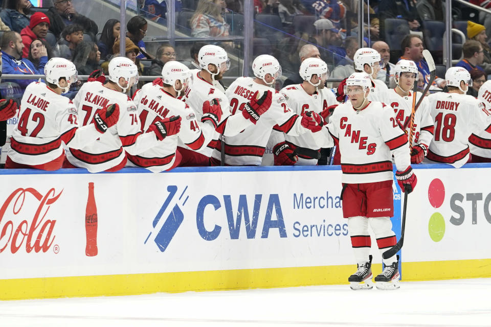 Carolina Hurricanes center Paul Stastny celebrates after his goal against the New York Islanders during the second period of an NHL hockey game, Saturday, Dec. 10, 2022, in Elmont, N.Y. (AP Photo/Mary Altaffer)