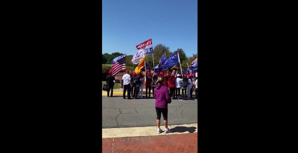 Supporters of US president Donald Trump appeared to block voting in Virginia on Saturday (Anthony Tilghman)