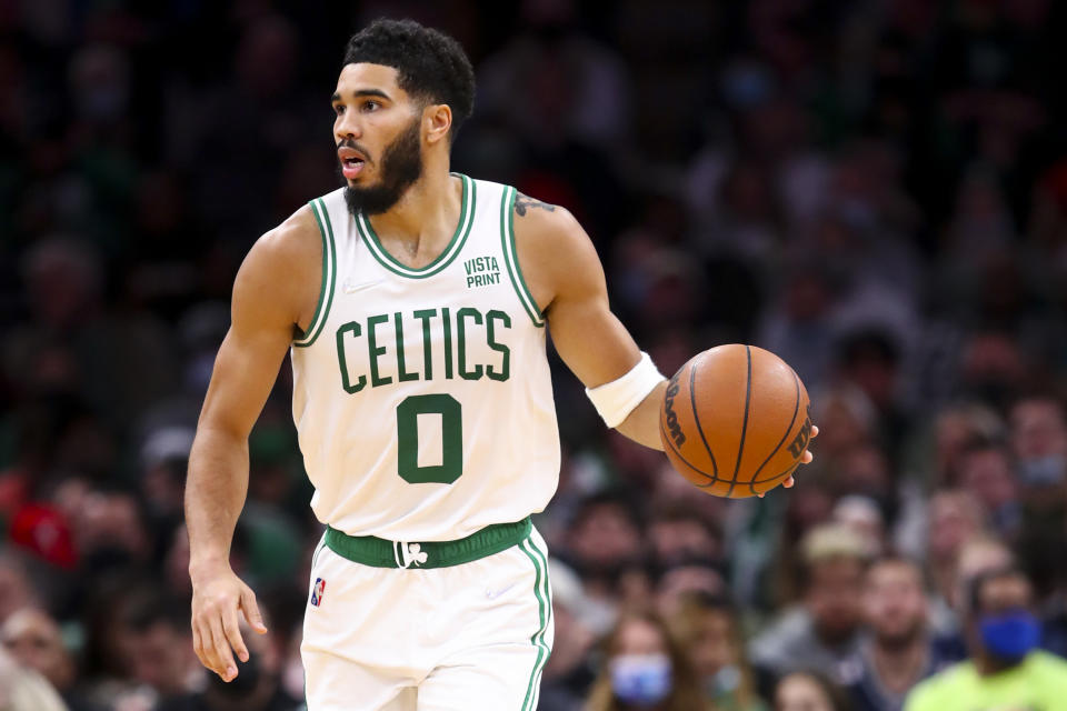 Pictured here, Boston's Jayson Tatum dribbles the ball up court during a game against the Philadelphia 76ers.