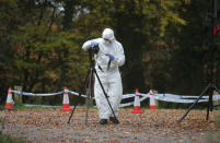 Forensic investigators at Watlington Hill in Oxfordshire after the body of a woman was discovered at the National Trust estate, a man has been arrested on suspicion of murder and is being treated for serious injuries, police said.