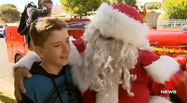 MFB firefighters arrived with gifts for the family. Photo: 7 News