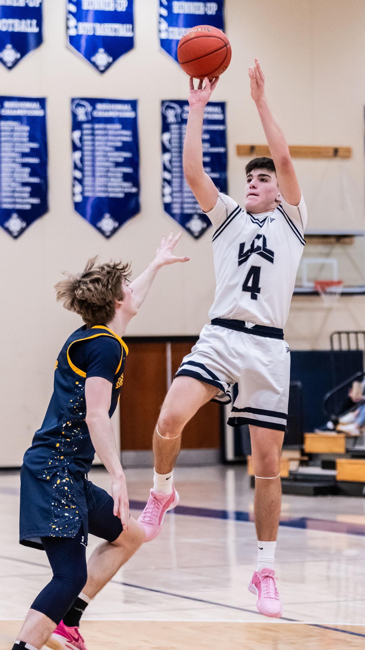 Lake Country Lutheran's Samuel Hans (4) elevates for a shot at home against Brookfield Academy, Saturday, Jan. 27, 2024.