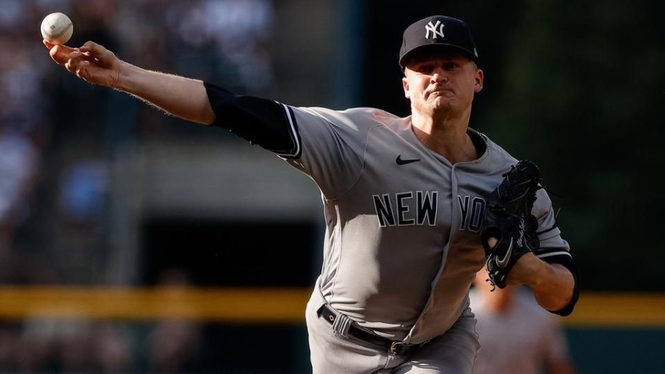 July 15, 2023;  Denver, Colorado, USA;  New York Yankees starting pitcher Clarke Schmidt (36) pitches in the first inning against the Colorado Rockies at Coors Field.