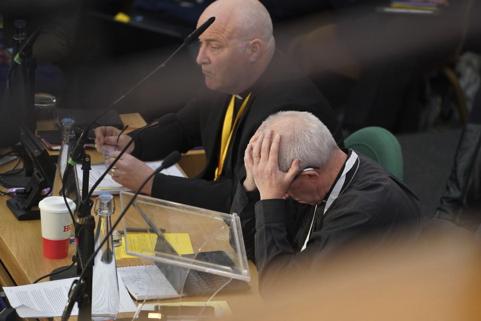 The Archbishop of Canterbury, Justin Welby gestures, during a Synod at the General Synod of the Church of England, at Church House to consider a motion which reviews the church's failure "to be welcoming to LGBTQI+ people" and the harm they have faced and still experience, in London, Thursday, Feb. 9, 2023. (James Manning/PA via AP)