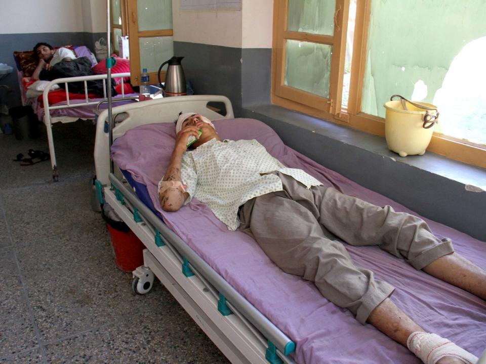 Injured men receive treatment at a hospital after a drone attack in Nangarhar, Afghanistan: AP