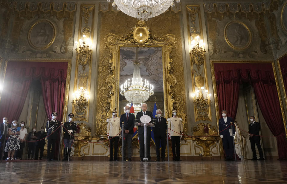 Italian President Sergio Mattarella, center, announces he has dissolved the Italian parliament Thursday, July 21, 2022, after Premier Mario Draghi had confirmed his resignation earlier in the morning. (AP Photo/Gregorio Borgia)