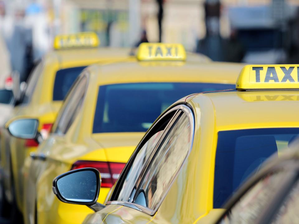 Yellow taxis in a line.