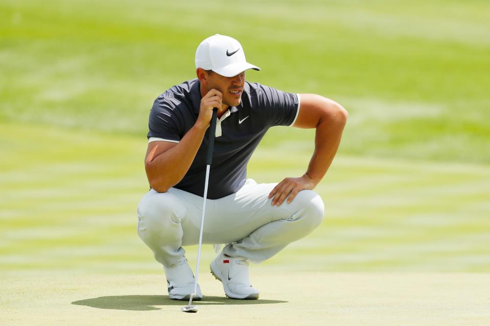 JERSEY CITY, NEW JERSEY - AUGUST 11: Brooks Koepka of the United States lines up a putt on the ninth green  during the final round of The Northern Trust at Liberty National Golf Club on August 11, 2019 in Jersey City, New Jersey. (Photo by Kevin C. Cox/Getty Images)