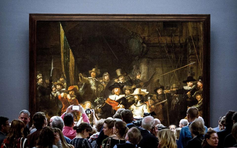 The trimmed version of the painting that has been on display for centuries - KOEN VAN WEEL /AFP 