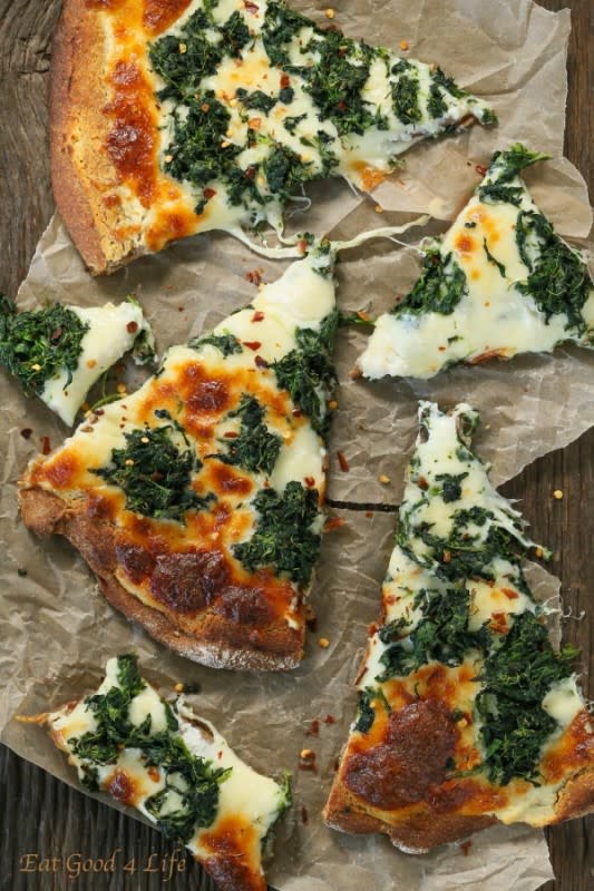 <p>This roasted garlic spinach white pizza is to die for!</p><p><strong>Get the recipe: <a href="https://www.eatgood4life.com/roasted-garlic-spinach-white-pizza/" rel="nofollow noopener" target="_blank" data-ylk="slk:Roasted Garlic Spinach White Pizza;elm:context_link;itc:0;sec:content-canvas" class="link rapid-noclick-resp">Roasted Garlic Spinach White Pizza</a></strong></p>