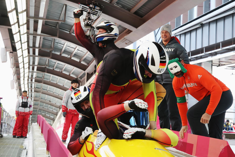 <p>Francesco Friedrich, Candy Bauer, Martin Grothkopp and Thorsten Margis of Germany celebrate winning gold as they finish their final run during the 4-man Boblseigh Heats on day sixteen of the PyeongChang 2018 Winter Olympic Games at Olympic Sliding Centre on February 25, 2018 in Pyeongchang-gun, South Korea. (Photo by Sean M. Haffey/Getty Images) </p>