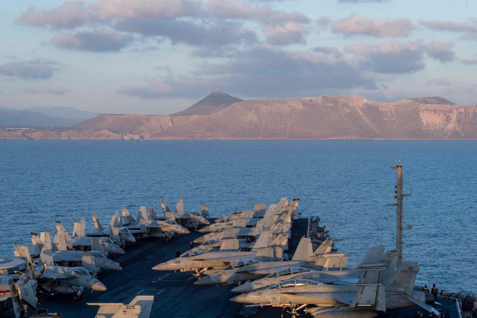 The Nimitz-class aircraft carrier USS Dwight D. Eisenhower prepares to port in Souda Bay, Greece on April 28.