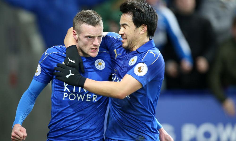 Jamie Vardy, left, celebrates giving Leicester City the lead against Liverpool at the King Power Stadium