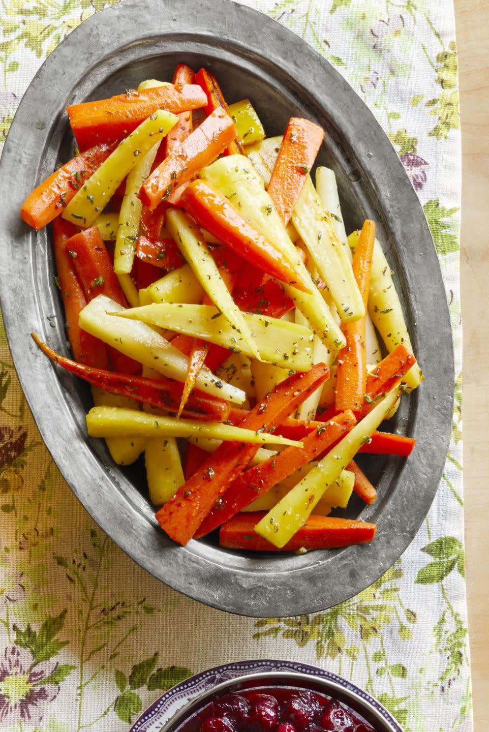 honey glazed carrots and parsnips on metal tray