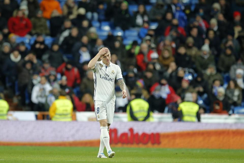 Real Madrid's Toni Kroos reacts after Celta scored their second goal during a Copa del Rey, quarter final, 1st leg soccer match between Real Madrid and Celta at the Santiago Bernabeu stadium in Madrid, Spain Wednesday Jan. 18, 2017. (AP Photo/Paul White)