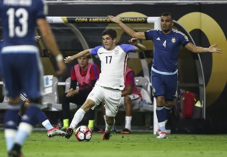 Jun 21, 2016; Houston, TX, USA; United States midfielder Christian Pulisic (17) attempts to control the ball during the second half against Argentina in the semifinals of the 2016 Copa America Centenario soccer tournament at NRG Stadium. Argentina won 4-0. Troy Taormina-USA TODAY Sports