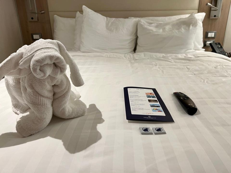 Towel animal on bed in Holland America Line interior room