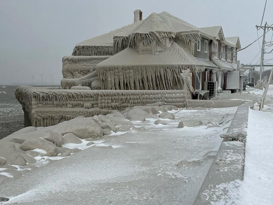 Hoak's restaurant is covered in ice from the spray of Lake Erie waves during a winter storm that hit the Buffalo region in Hamburg, New York, U.S. December 24, 2022.