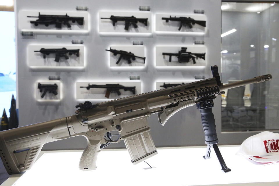 A Turkish-made MPT-76 infantry rifle is on display at the International Defense Exhibition and Conference in Abu Dhabi, United Arab Emirates, Sunday, Feb. 17, 2019. The biennial arms show in Abu Dhabi comes as the United Arab Emirates faces increasing criticism for its role in the yearlong war in Yemen. (AP Photo/Jon Gambrell)