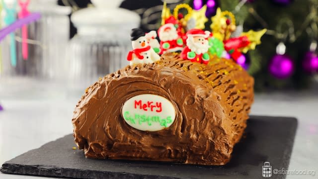 Chocolate and Coffee Christmas Log Cake with decorations