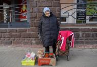 Pensioner Vera Ivanova sells goods on the street in Kaluga