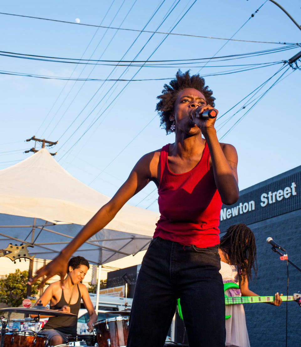 Jasmine Nyende performing with Fuck U Pay Us. (Photo courtesy of Jasmine Nyende’s private collection.)