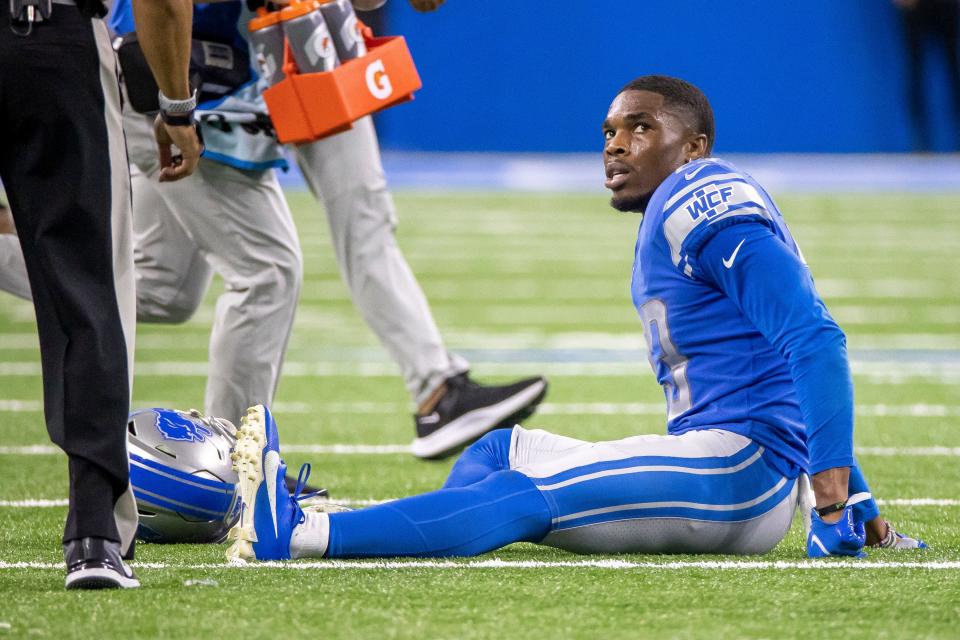 Detroit Lions cornerback Jeff Okudah (23) sits on the field with a season ending torn Achilles tendon in the second half of an NFL game against the San Francisco 49ers at Ford Field on Sep 12, 2021.