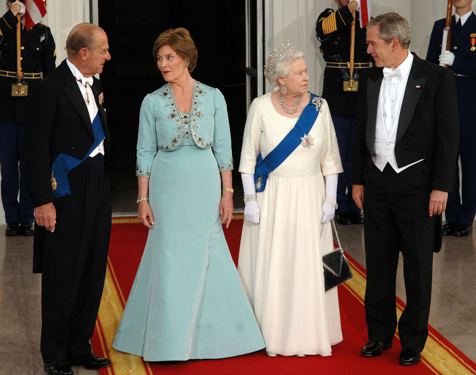 The Duke of Edinburgh, Laura Bush, HM Queen Elizabeth II and President George W. Bush attend a State Banquet at the White House, Washington DC on May 7, 2007.  / Credit: Photo by Anwar Hussein/WireImage