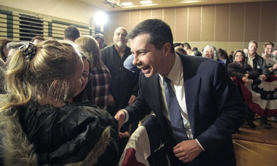 Buttigieg meets with members of the audience following an election rally in Sioux City, Iowa, on Thursday.