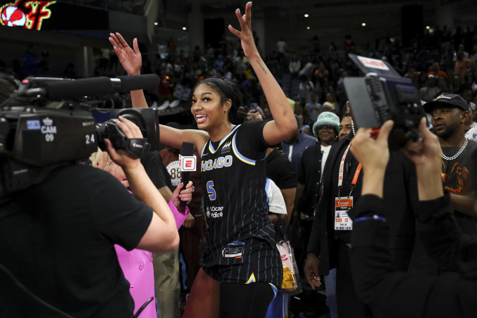 Chicago Sky forward Angel Reese (5) is interviewed by Holly Rowe after the Sky defeated the Indiana Fever, 88-87, in a WNBA basketball game, Sunday, June 23, 2024, in Chicago. (Eileen T. Meslar/Chicago Tribune via AP)