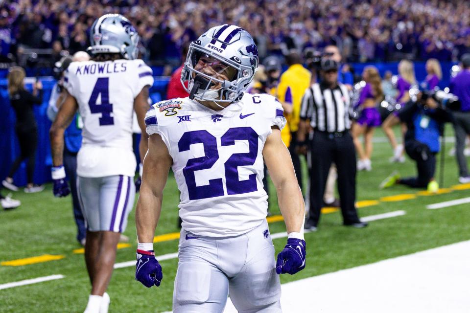 Kansas State Wildcats running back Deuce Vaughn (22) celebrates his touchdown scored against the Alabama Crimson Tide during the first half in the 2022 Sugar Bowl at Caesars Superdome.