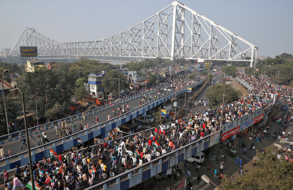 Supporters of Mamata Banerjee, the Chief Minister of West Bengal, attend a protest march against the National Register of Citizens (NRC) and a new citizenship law, in Kolkata, India, December 18, 2019. REUTERS/Rupak De Chowdhuri