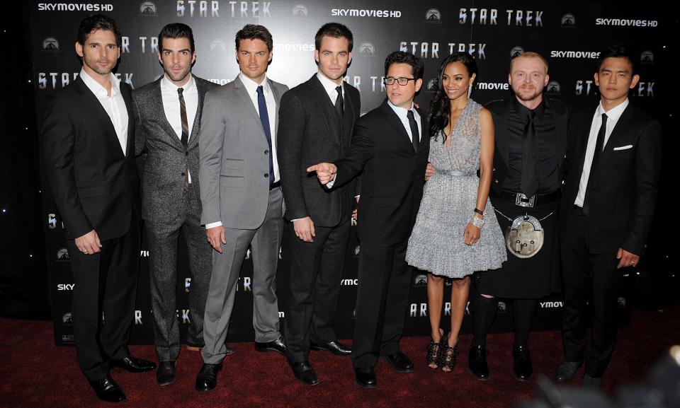 (L-R) Eric Bana, Zachary Quinto, Karl Urban, CHris Pine, JJ Abrams, Zoe Saldana, Simon Pegg and John Cho pose for photographers at the UK Film Premiere of Star Trek at the Empire Leicester Square, London.   (Photo by Ian West - PA Images/PA Images via Getty Images)